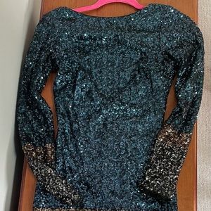 Sequin “Dress the Population” cocktail dress.